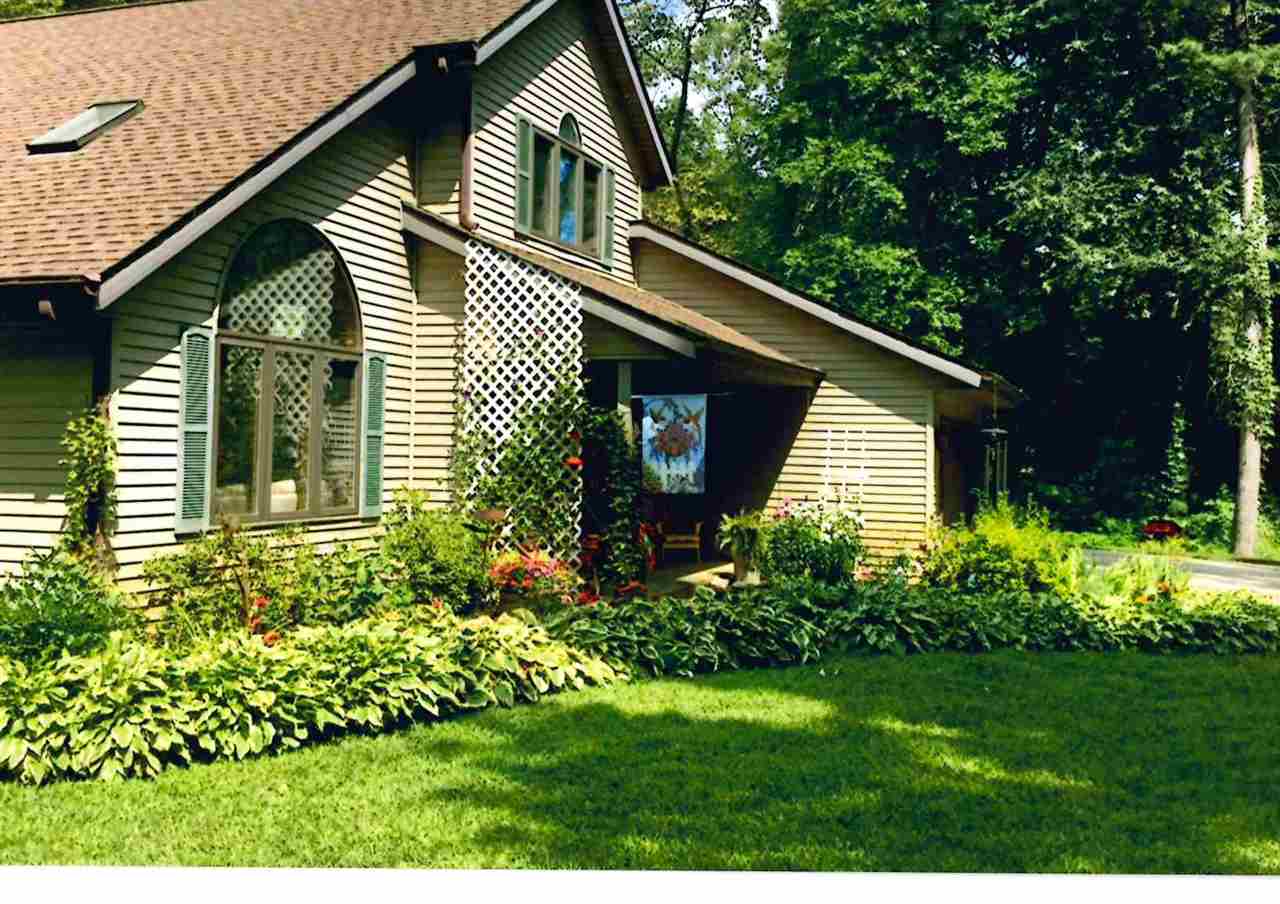 3745 Freeport Road Rockton, IL 61072 - Photo 3 of 24 a view of a house with a yard