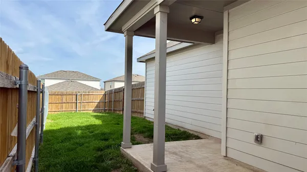a view of a porch with a backyard