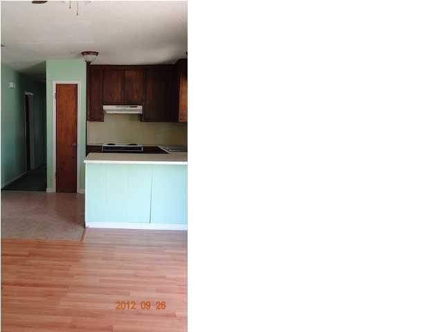 6184 Old Hickory Road Crestview, FL 32539 - Photo 5 of 14 a kitchen with a sink and a stove