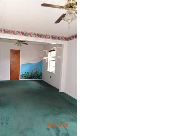 6184 Old Hickory Road Crestview, FL 32539 - Photo 7 of 14 a view of a hallway