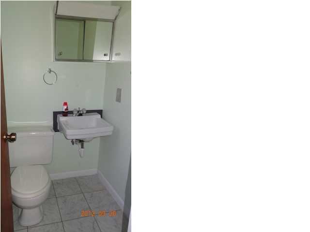 6184 Old Hickory Road Crestview, FL 32539 - Photo 8 of 14 a bathroom with a sink and a toilet