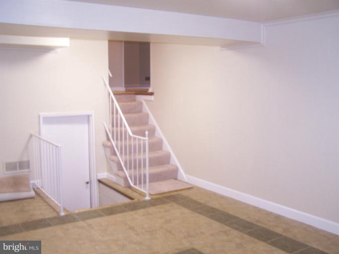 6002 Greentree Road Bethesda, MD 20817 - Photo 3 of 14 a view of an entryway with staircase