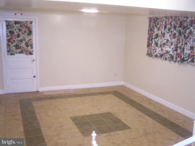 6002 Greentree Road Bethesda, MD 20817 - Photo 7 of 14 a view of a small space with a window
