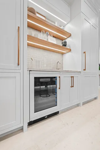 a spacious bedroom with a bed and a window