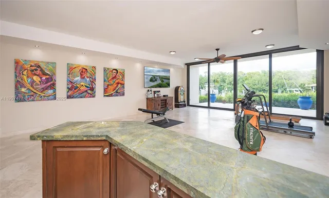 a very nice looking dining room with a table or chairs and a large window