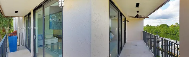 a bathroom with a toilet a sink a mirror and a shower