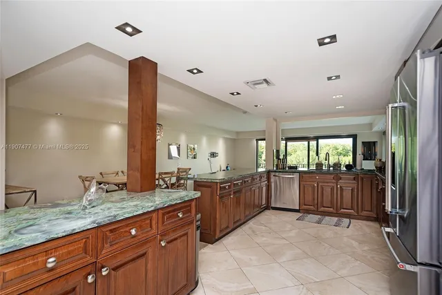 a view of hallway with cabinets