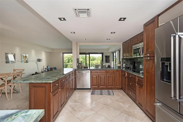 a spacious bedroom with a bed and a couch