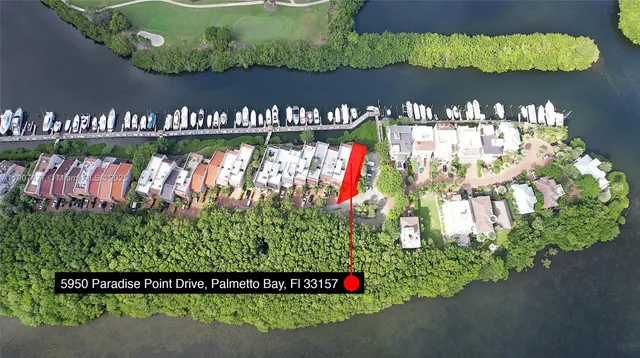 a very nice looking room with a large window and couch