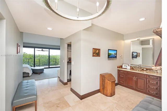 a view of the backyard of the house