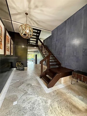 a view of a patio with a garden and plants