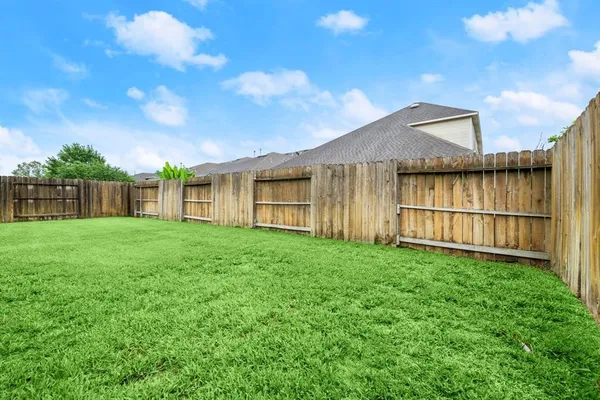 a view of a backyard with a garden