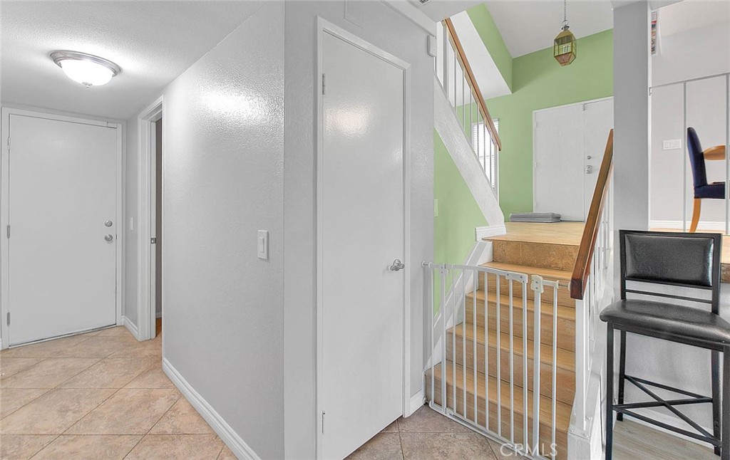 5 Navajo Trail Lane Phillips Ranch, CA 91766 - Photo 23 of 65 Stairs to the family room and den and 3/4 bathroom