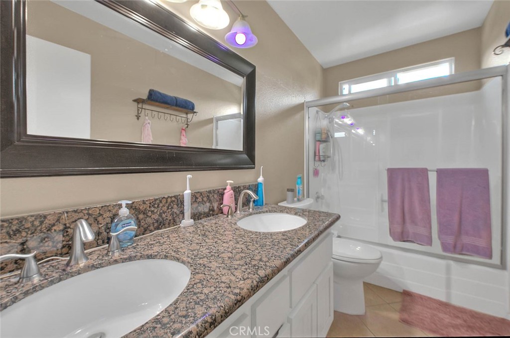 5 Navajo Trail Lane Phillips Ranch, CA 91766 - Photo 40 of 65 Twin sinks and granite counter tops.