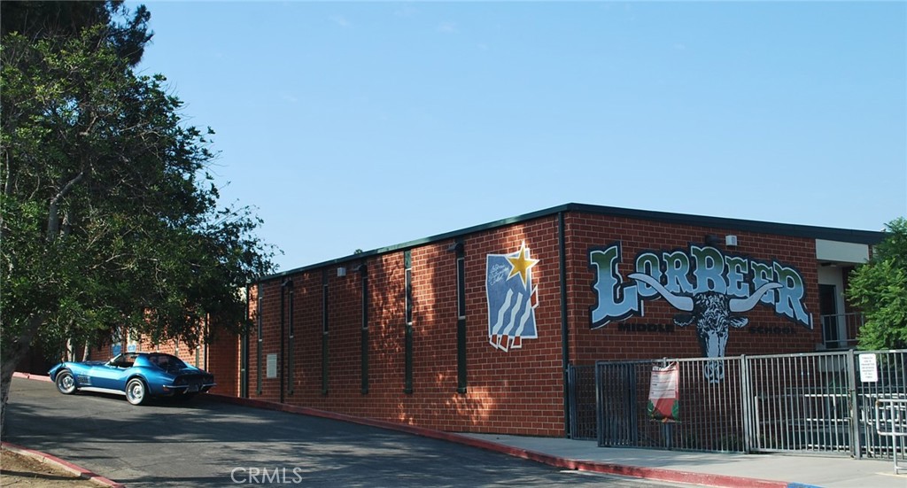 5 Navajo Trail Lane Phillips Ranch, CA 91766 - Photo 64 of 65 a front view of a house with garden