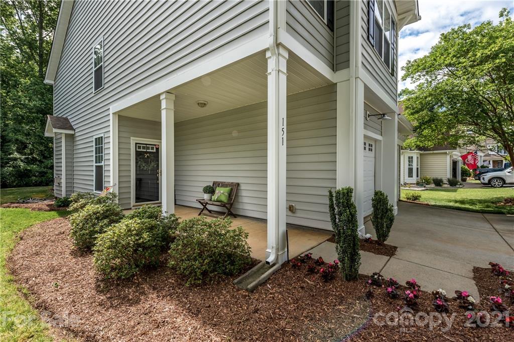 151 Whitley Mills Road Fort Mill, SC 29708 - Photo 2 of 33 a backyard of a house with lots of green space