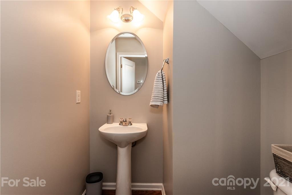 151 Whitley Mills Road Fort Mill, SC 29708 - Photo 16 of 33 a bathroom with a sink toilet and a mirror