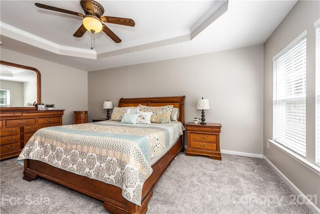 151 Whitley Mills Road Fort Mill, SC 29708 - Photo 18 of 33 a bedroom with bed and window