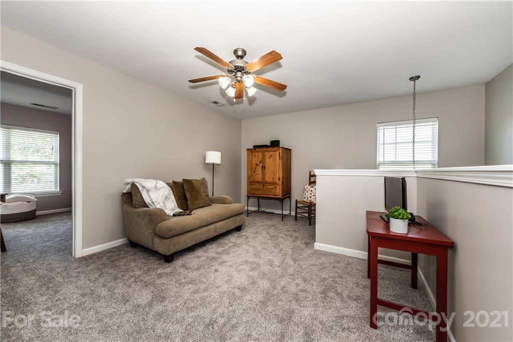 151 Whitley Mills Road Fort Mill, SC 29708 - Photo 23 of 33 a living room with furniture and a window