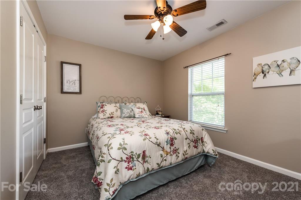 151 Whitley Mills Road Fort Mill, SC 29708 - Photo 25 of 33 a bedroom with a bed and a window