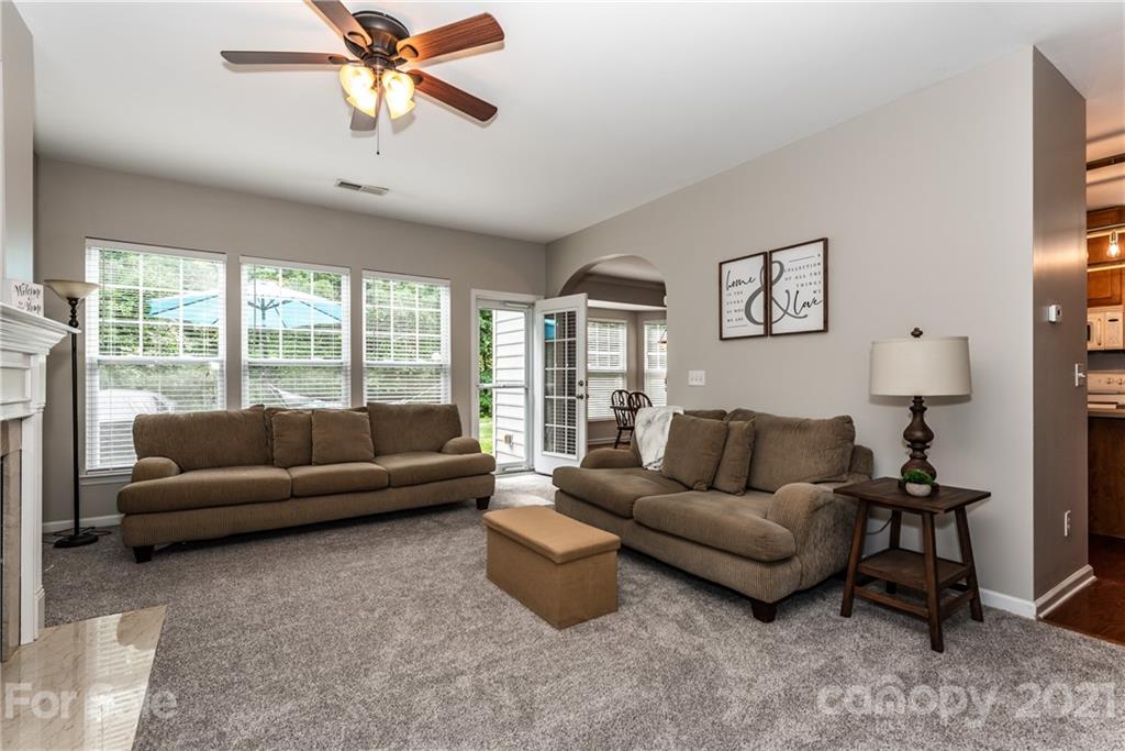 151 Whitley Mills Road Fort Mill, SC 29708 - Photo 4 of 33 a living room with furniture and a large window