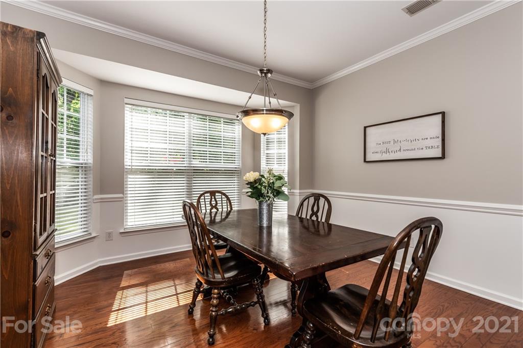 151 Whitley Mills Road Fort Mill, SC 29708 - Photo 8 of 33 a dining room with furniture and window