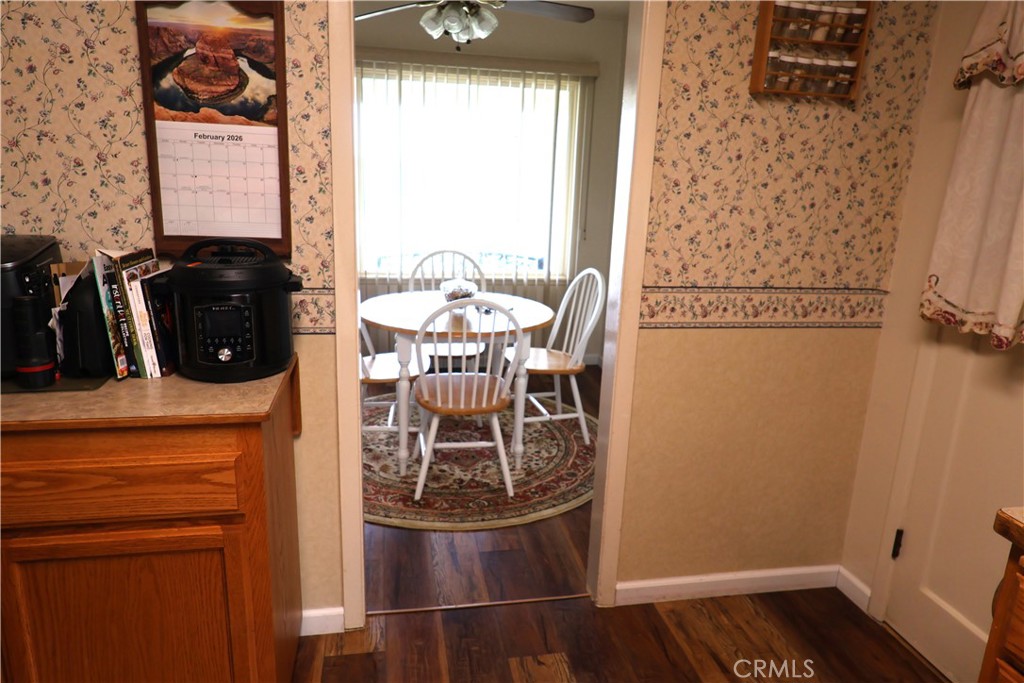 1409 North Street Corning, CA 96021 - Photo 19 of 40 view of a room with wooden floor and windows