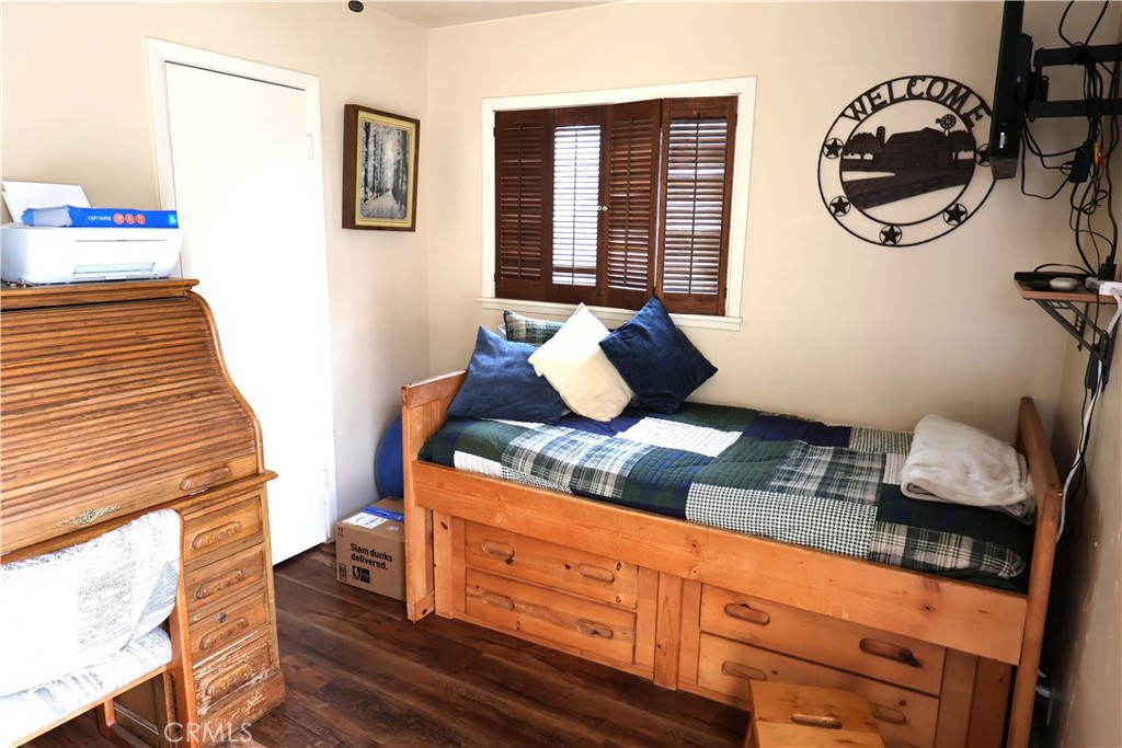 1409 North Street Corning, CA 96021 - Photo 29 of 40 a living room with furniture and a window