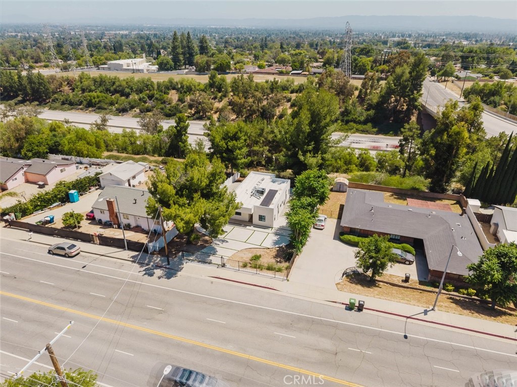 17846 Rinaldi Street Granada Hills, CA 91344 - Photo 32 of 34 an aerial view of a city with streets and houses
