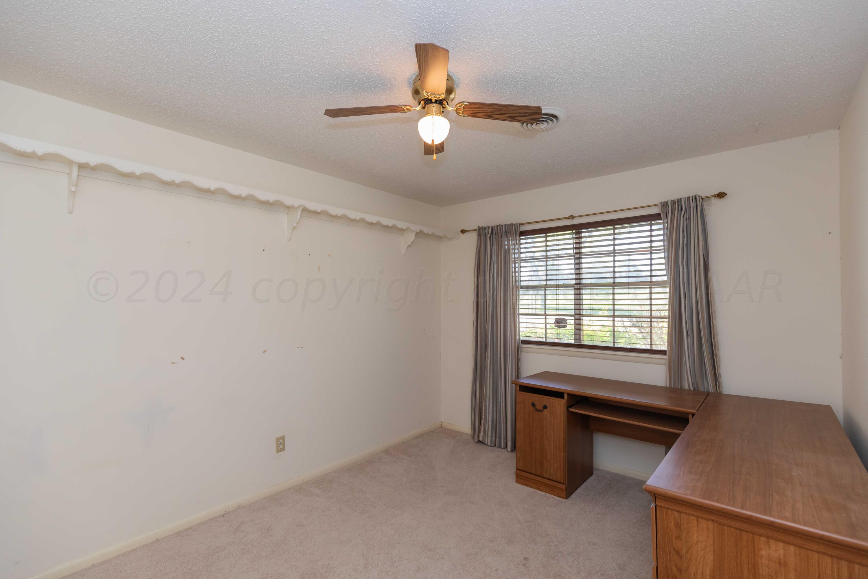 4400 Gem Lake Road Amarillo, TX 79106 - Photo 27 of 57 a view of workspace with window