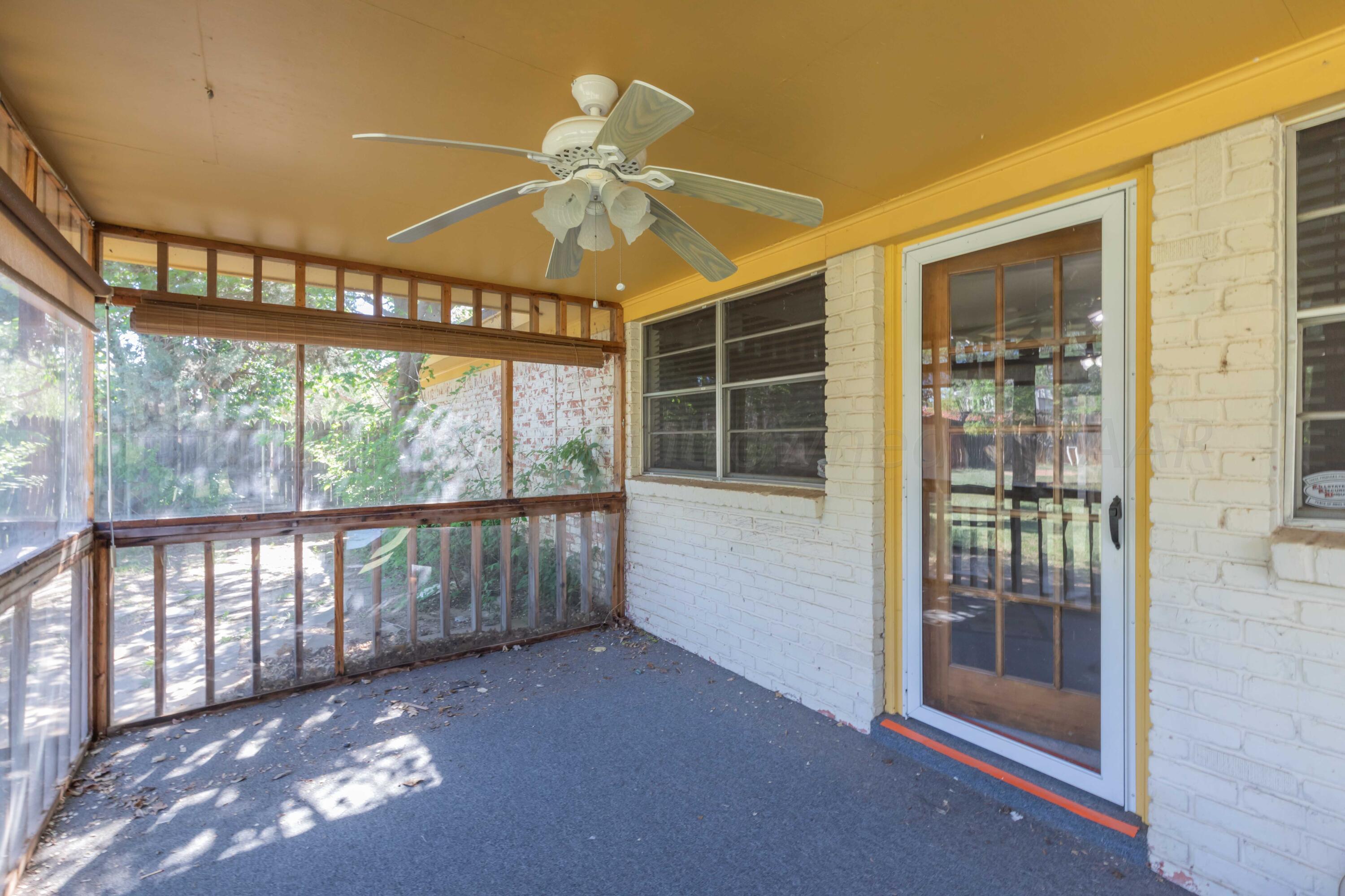 4400 Gem Lake Road Amarillo, TX 79106 - Photo 46 of 57 wooden floor in an empty room with a window