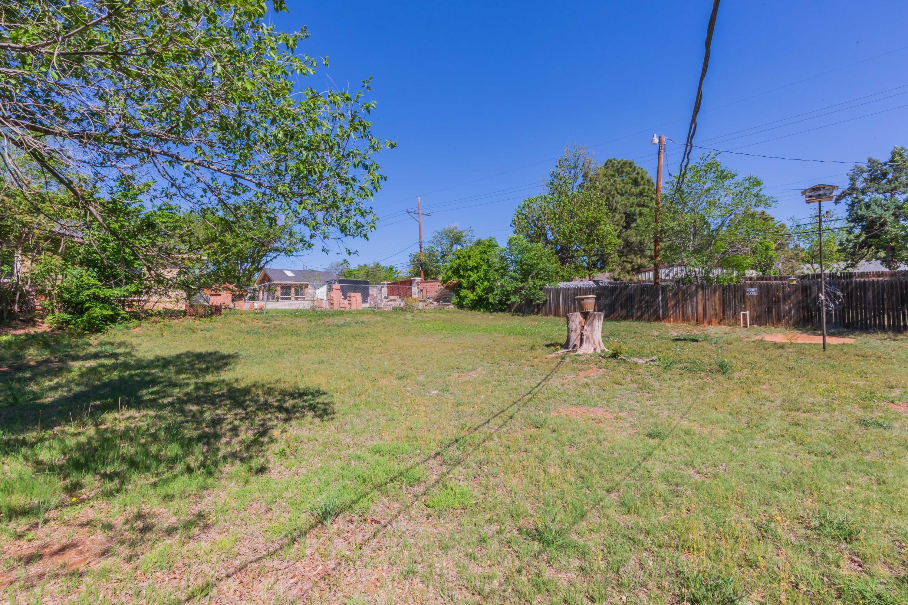 4400 Gem Lake Road Amarillo, TX 79106 - Photo 51 of 57 a backyard of a house with lots of green space