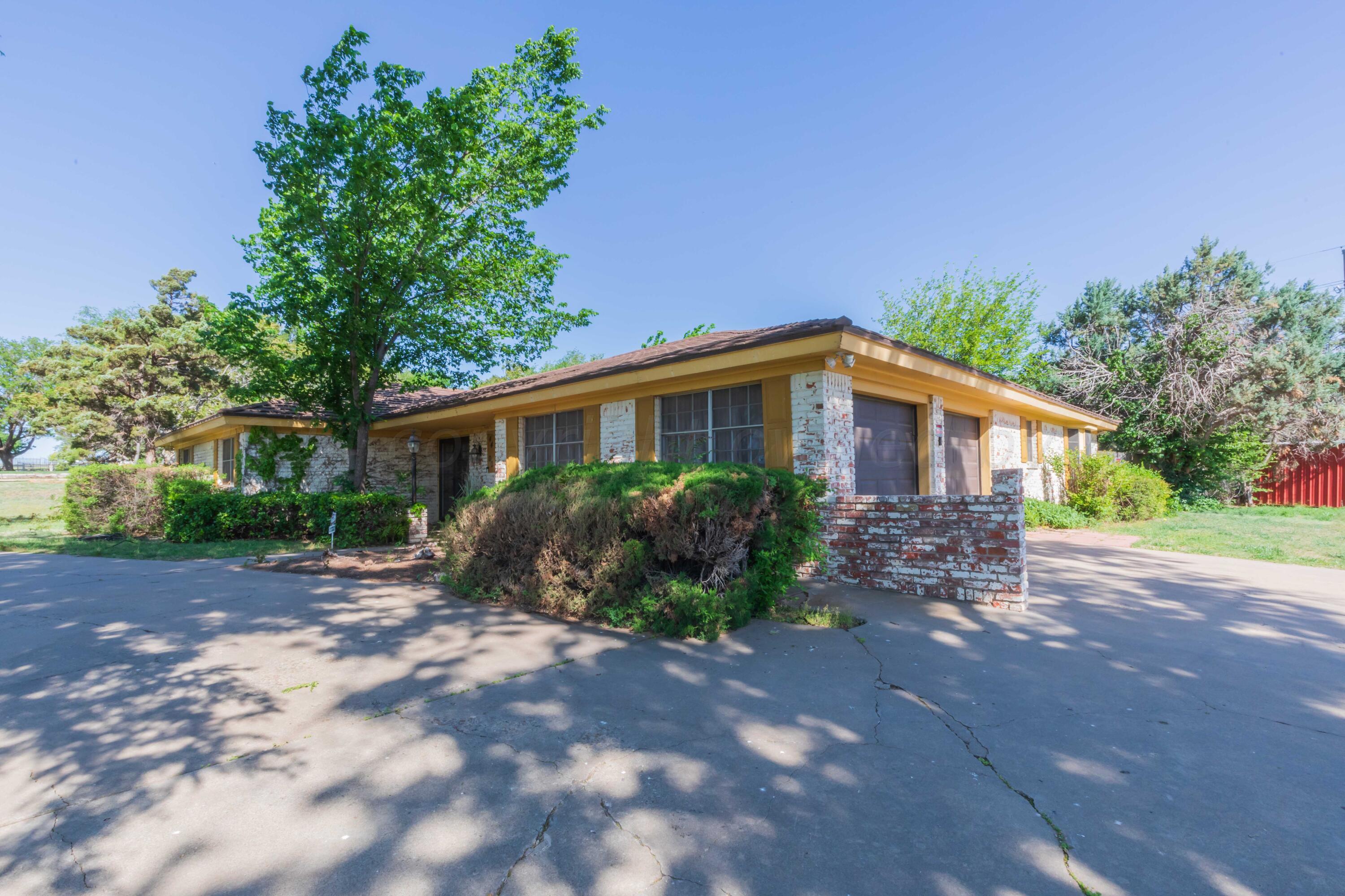 4400 Gem Lake Road Amarillo, TX 79106 - Photo 56 of 57 a view of a house with a backyard