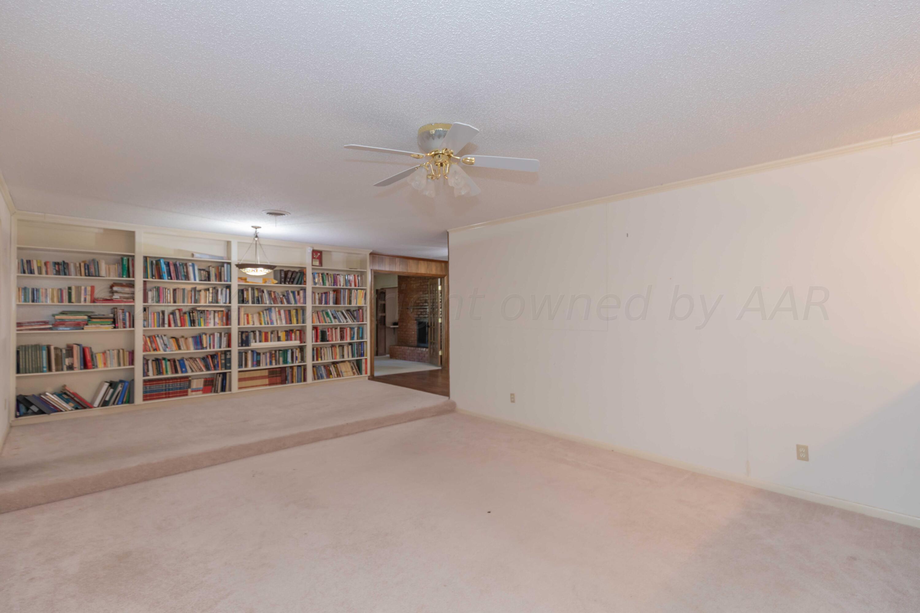 4400 Gem Lake Road Amarillo, TX 79106 - Photo 6 of 57 a view of an empty room with a window