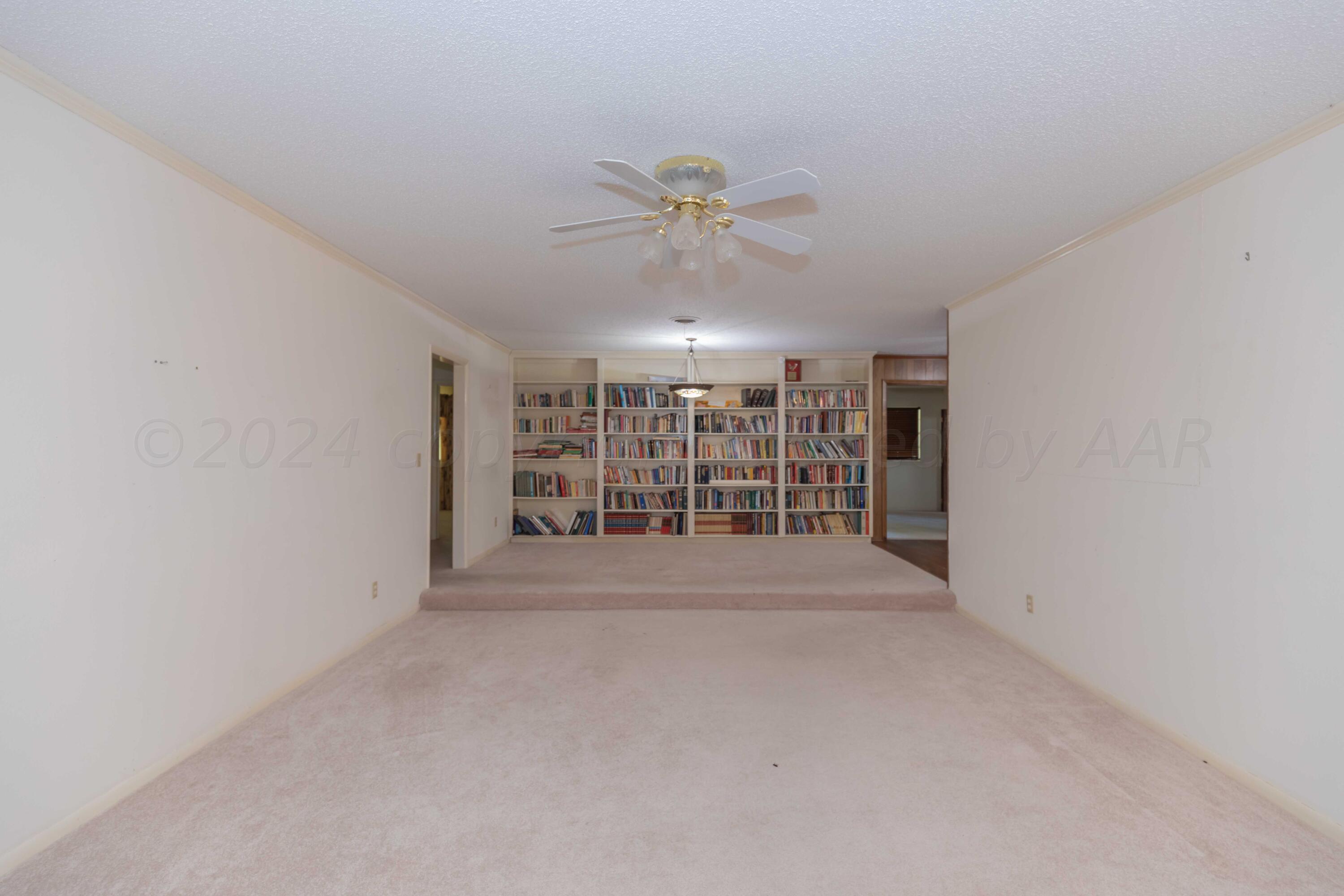 4400 Gem Lake Road Amarillo, TX 79106 - Photo 7 of 57 a view of an empty room with a window