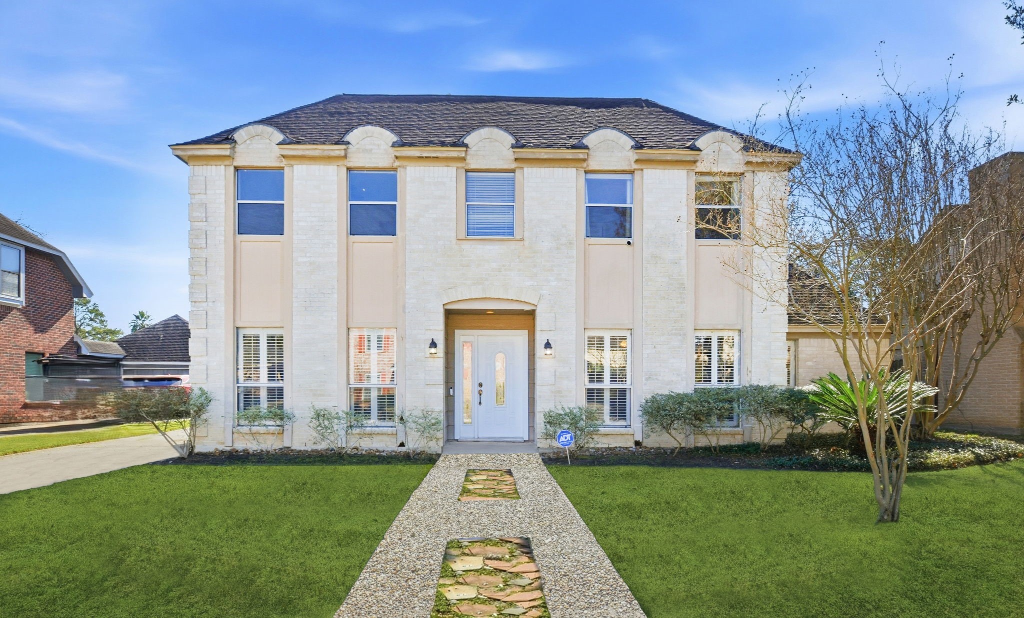 This classic one-owner Cypresswood beauty surprises with soaring ceilings and lush backyard complete with a swimming pool. The location is stellar and its unique facade is a standout in the neighborhood.