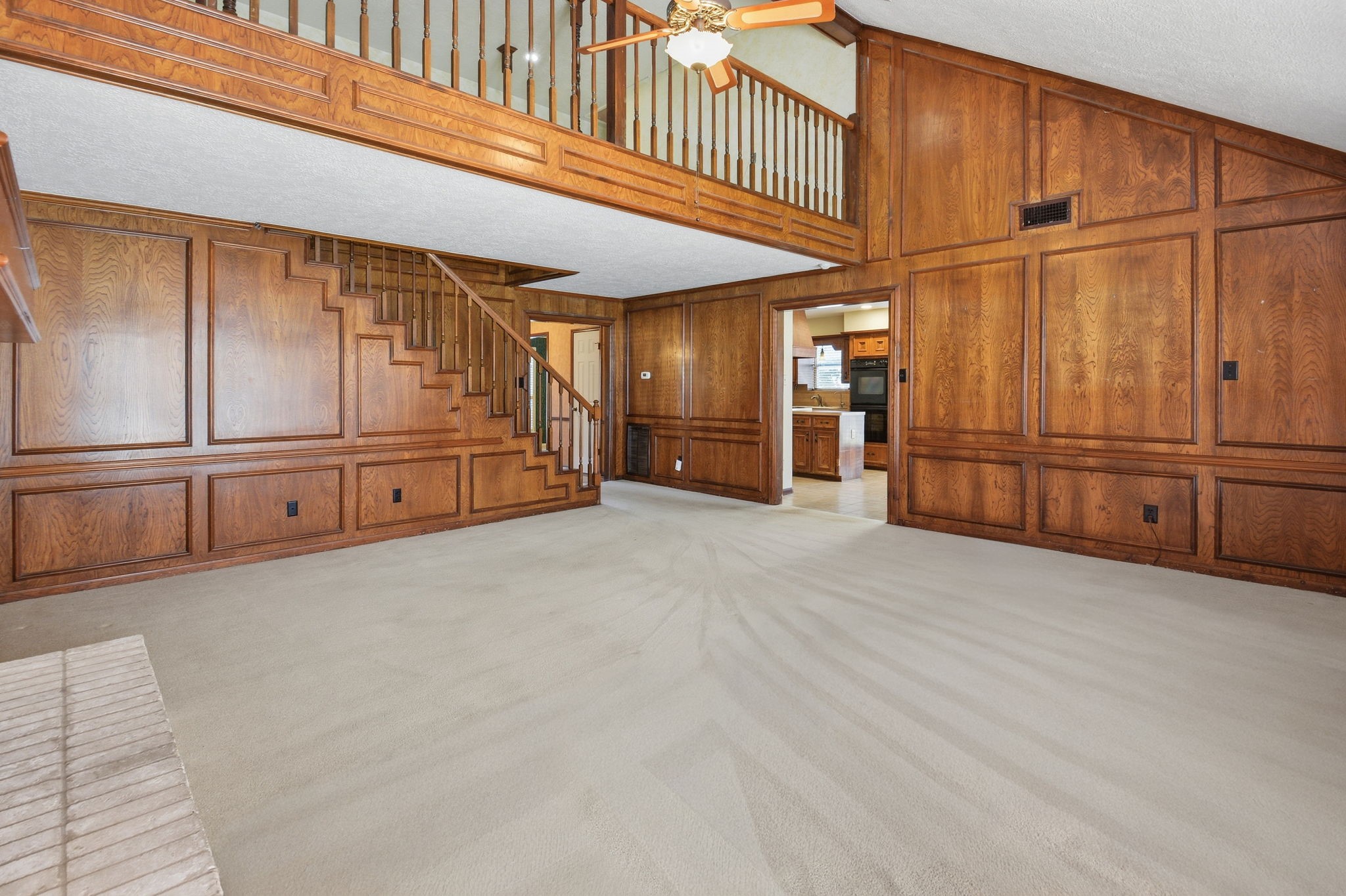 3607 El James Drive Spring, TX 77388 - Photo 11 of 50 This view of the living room shows the loft space upstairs and gives you an idea of the shear size of this beautiful room.