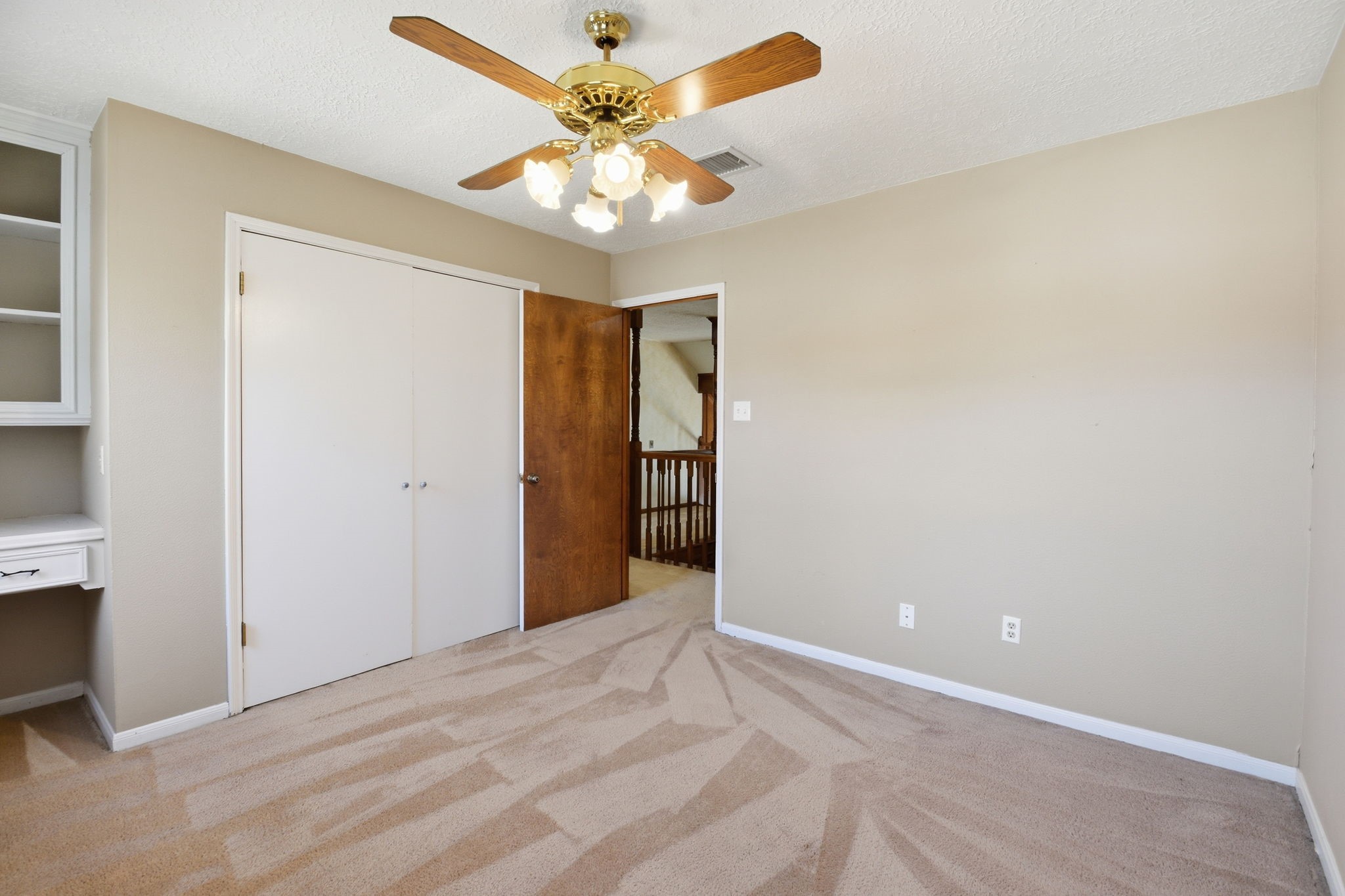 3607 El James Drive Spring, TX 77388 - Photo 29 of 50 Bedroom one of three upstairs, this shot partially showing the built-ins.