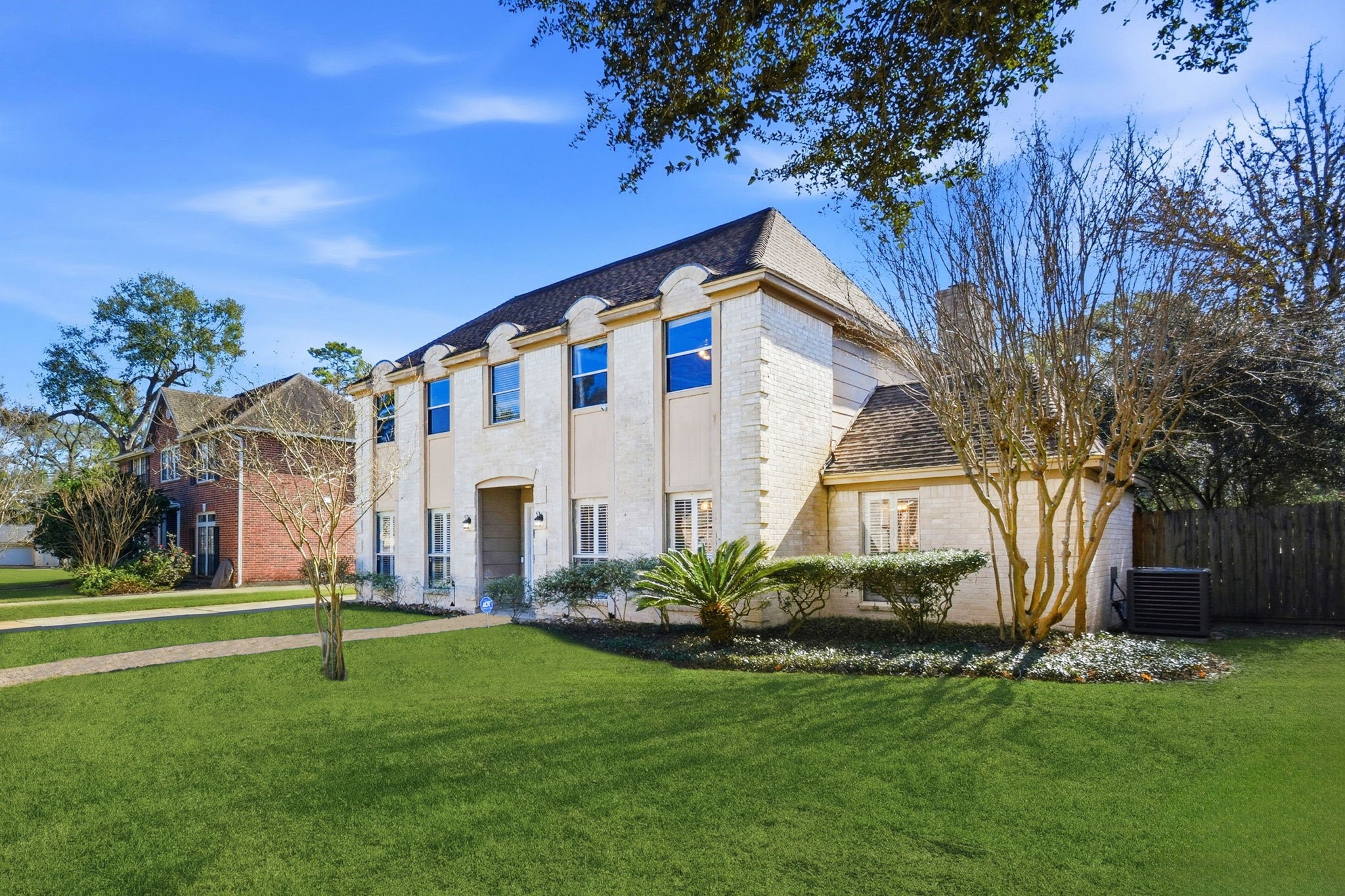3607 El James Drive Spring, TX 77388 - Photo 3 of 50 A look from the other side. Two story brick home with so many windows to allow natural light to pour in.