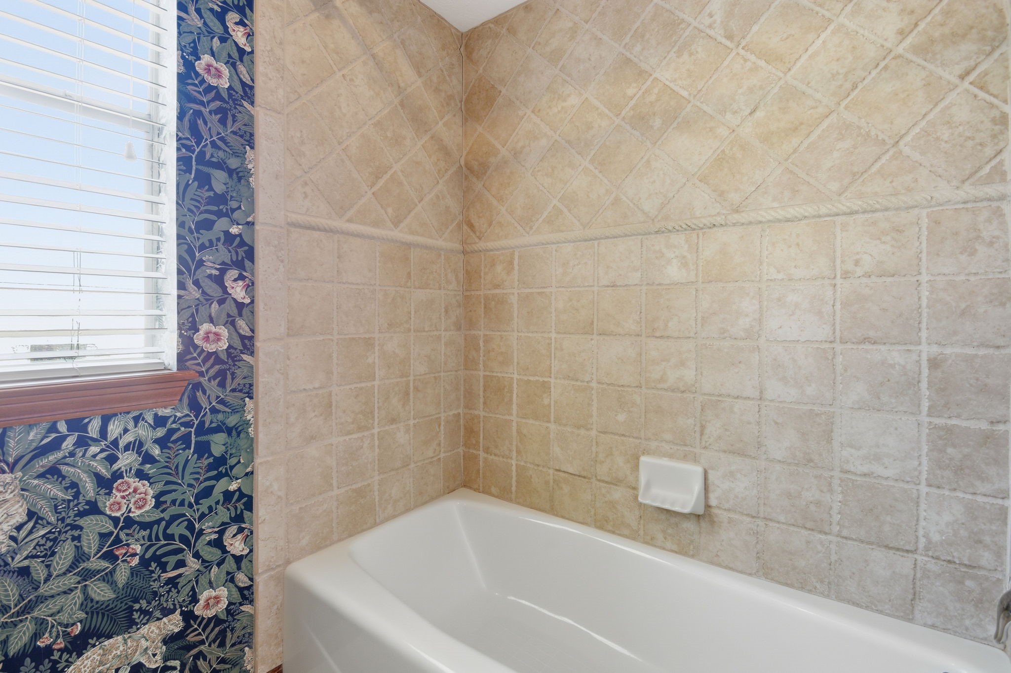 3607 El James Drive Spring, TX 77388 - Photo 31 of 50 The combo tub/shower is separated from the vanity and has floor-to-ceiling built in cabinets for a ton of storage.