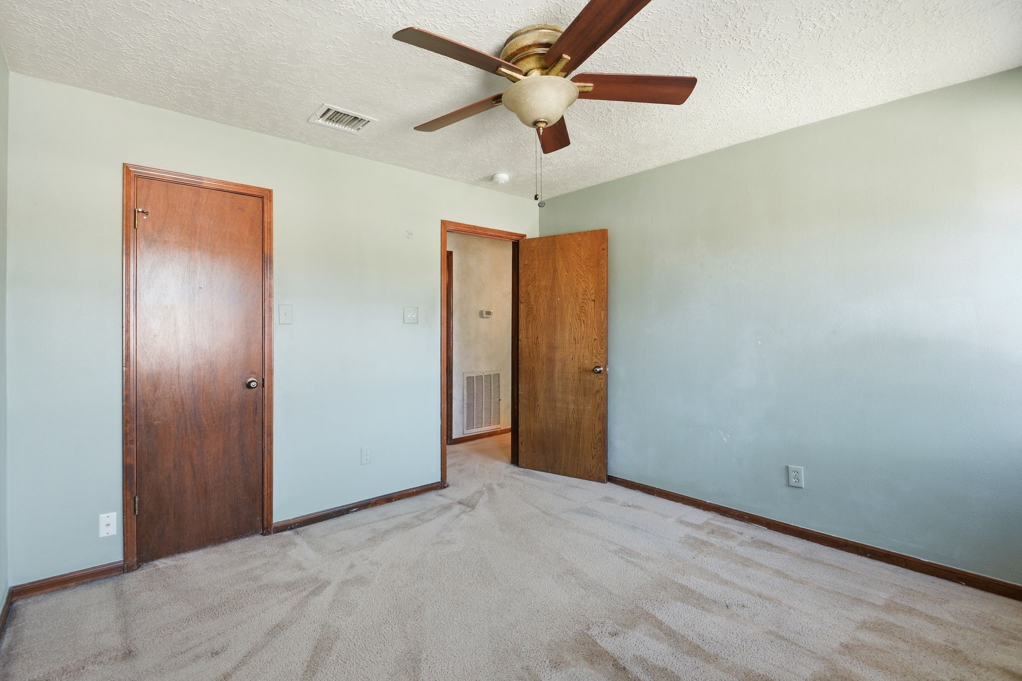 3607 El James Drive Spring, TX 77388 - Photo 33 of 50 Another view of bedroom two (of three upstairs), with walk-in closet and ceiling fan.