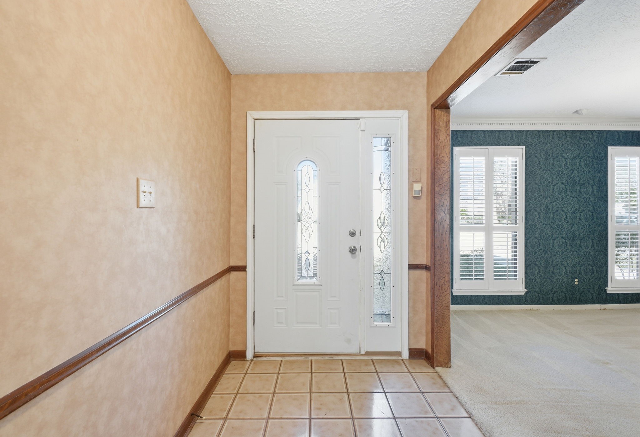 3607 El James Drive Spring, TX 77388 - Photo 5 of 50 A true foyer greets your guests and is large enough for an entryway table or console, bench or other piece. This classic space is superior to an entrance directly into a living space. The primary bedroom suite is located off of the far end of the foyer, just before the staircase.