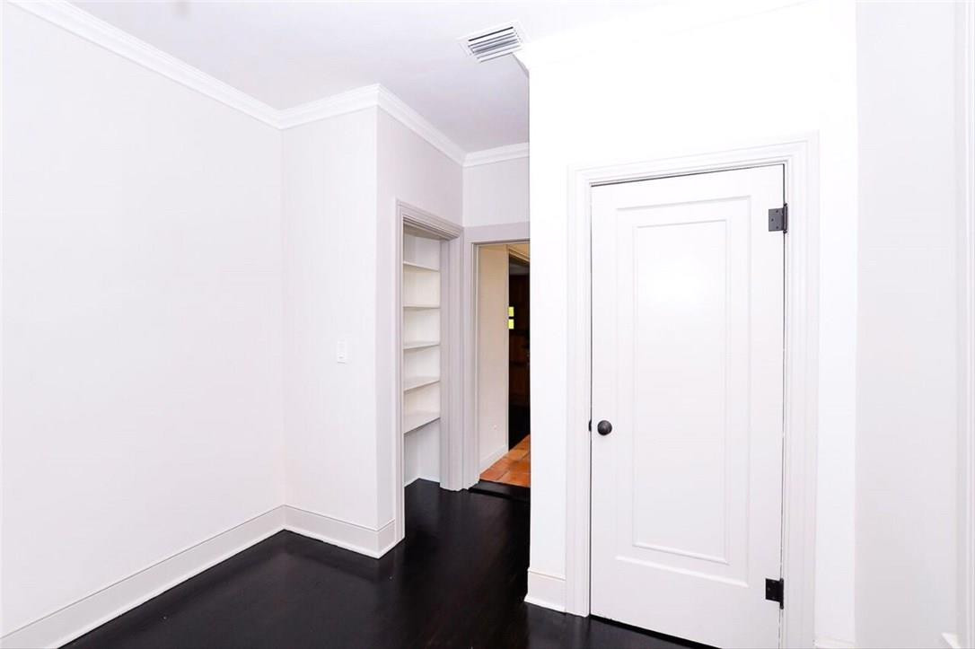 734 Avon Road West Palm Beach, FL 33401 - Photo 16 of 26 a view of front door with wooden floor