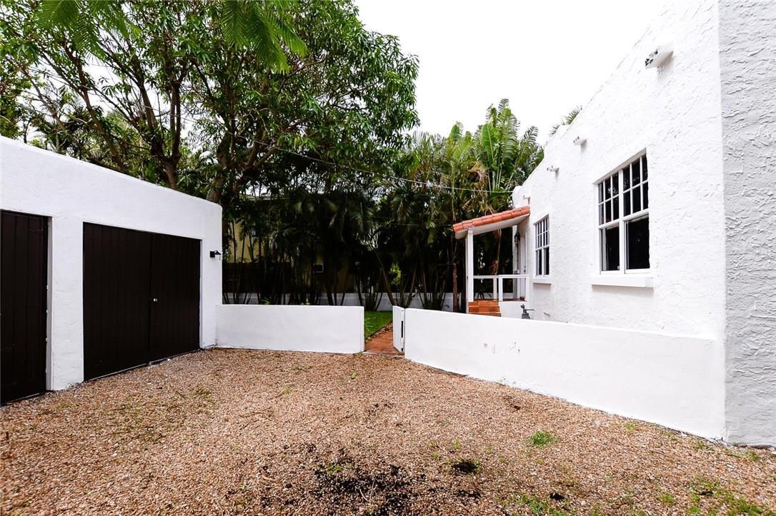 734 Avon Road West Palm Beach, FL 33401 - Photo 23 of 26 a view of a house with a backyard