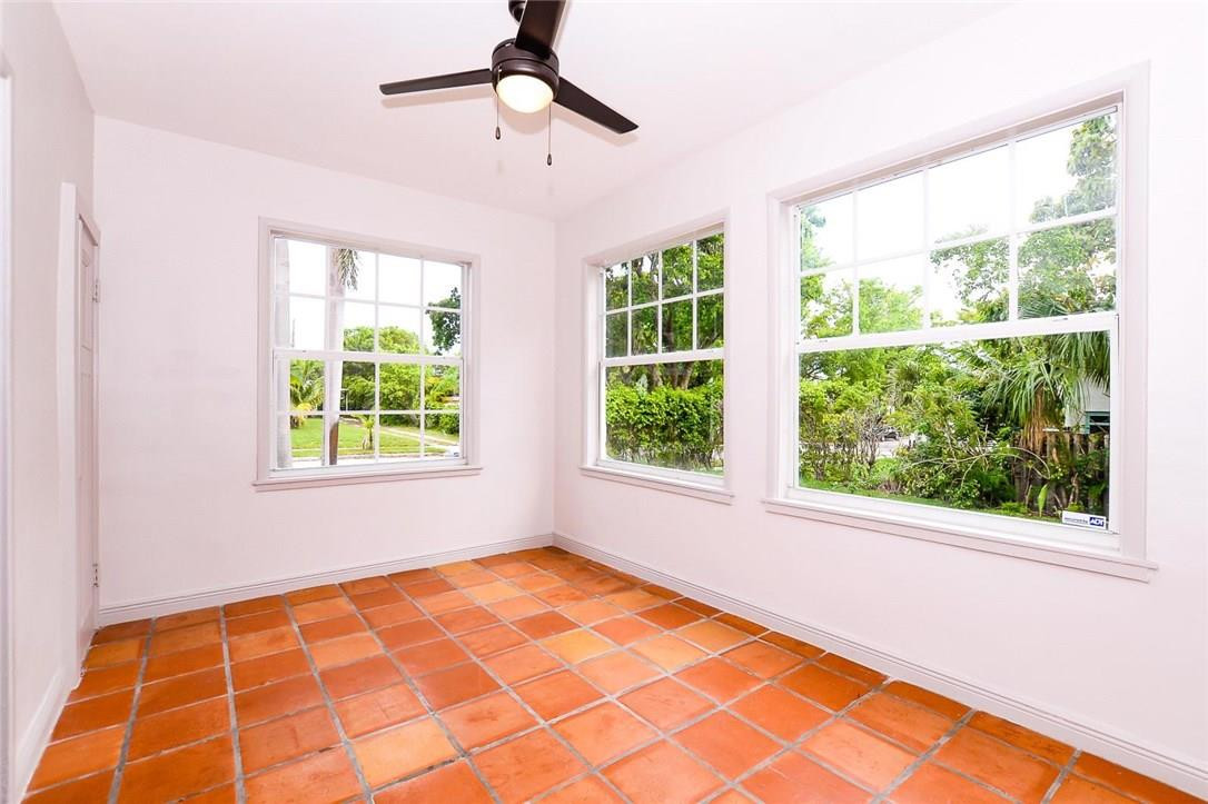 734 Avon Road West Palm Beach, FL 33401 - Photo 10 of 26 a view of an empty room with a window