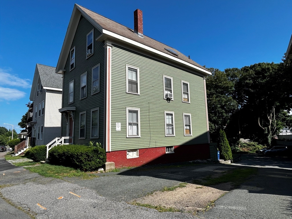 55 Hale Street, Unit 1 Beverly, MA 01915 - Photo 2 of 13 a front view of a house