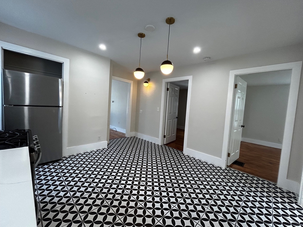 55 Hale Street, Unit 1 Beverly, MA 01915 - Photo 6 of 13 a view of a hallway