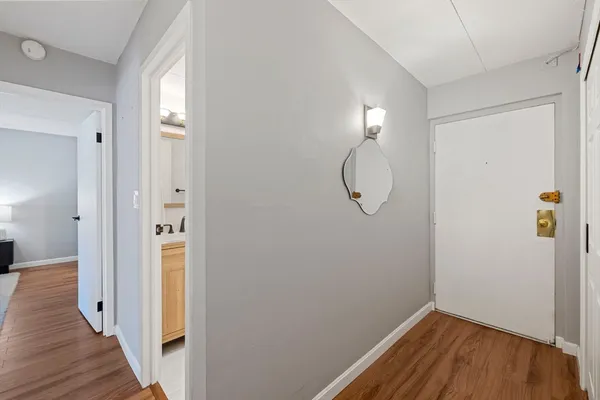 a view of a livingroom with wooden floor