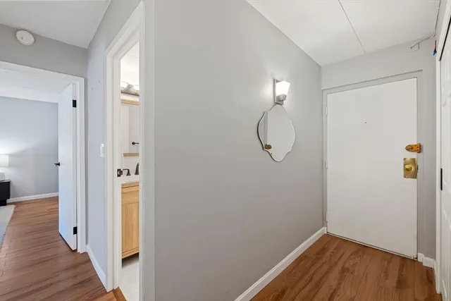 a view of a livingroom with wooden floor