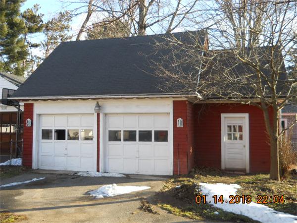 321 Longhill Street Springfield, MA 01108 - Photo 3 of 5 a front view of a house